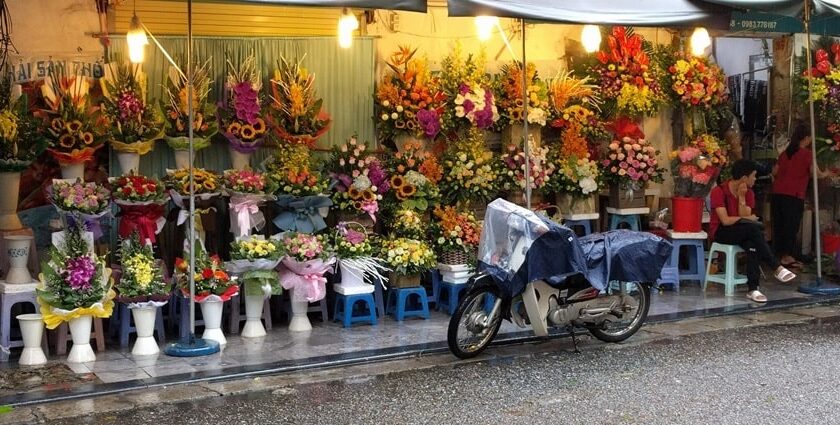 Explore shopping in Hanoi in the street market with local products on sale.