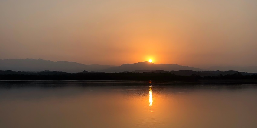 Sunrise over the Sukhna lake, seen from the lake promenade one of the places in Zirakpur