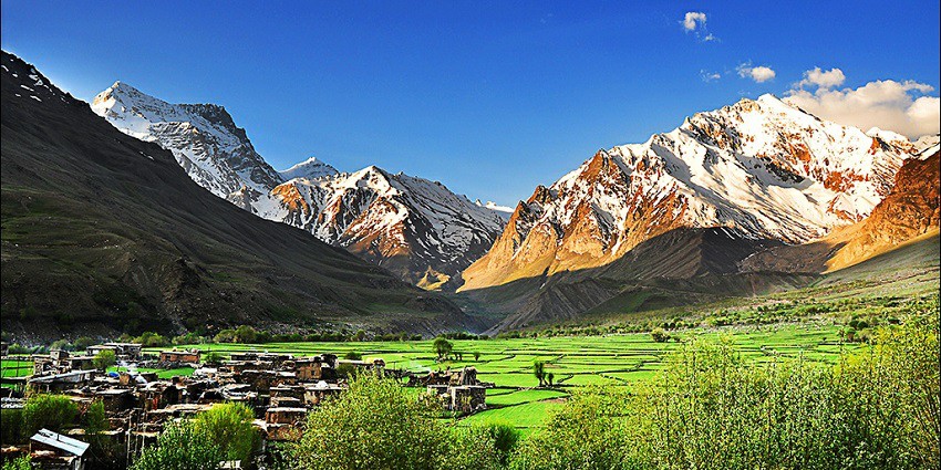 Panoramic view of the Sumur Village amidst the hills of scenic mountains of Himalayas