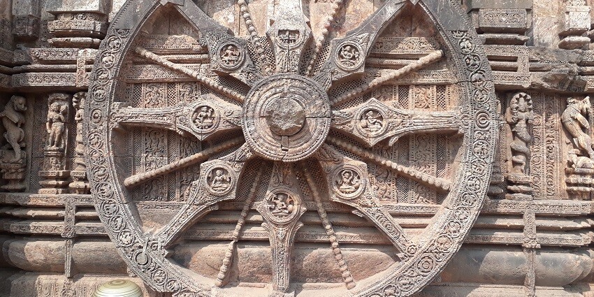 Artwork of Chariot wheels and sculptures in Konark Sun temple in Odisha