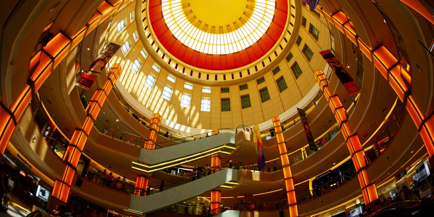 An inside view of Sunway Pyramid shopping mall, with bright and lively surroundings.