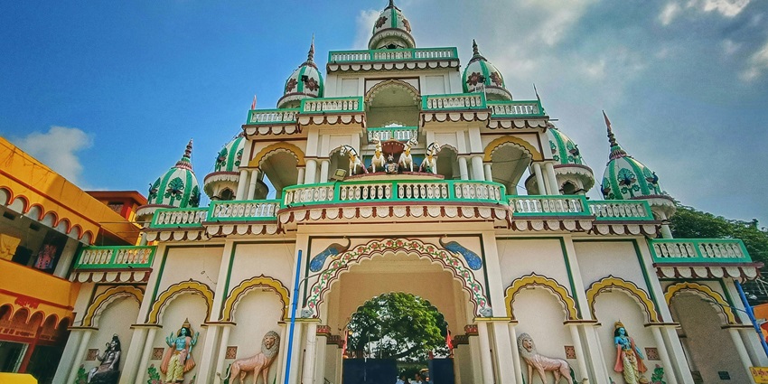 A view of the traditional Surya Narayan Temple set against a serene natural backdrop.
