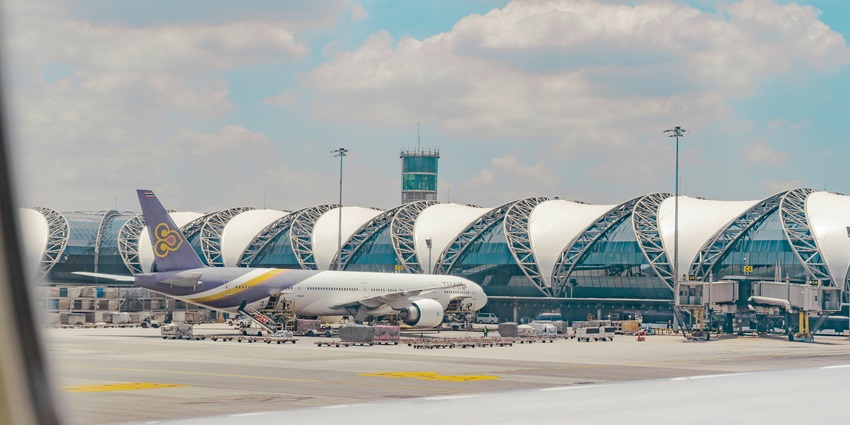 A breathtaking view of Suvarnabhumi airport with stunning architecture during the daytime.
