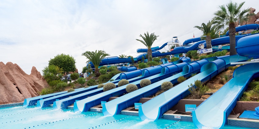The Swapna Srushti water park features various water slides.