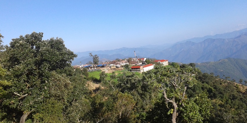 The Swargadwari Temple in Phythan, Nepal, surrounded by lush greenery and scenic hills.