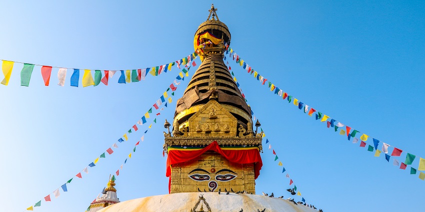 Swayambhunath Stupa
Alt Text: Swayambhunath Stupa forms a complex of shrines, monasteries, and multicoloured prayer flags.