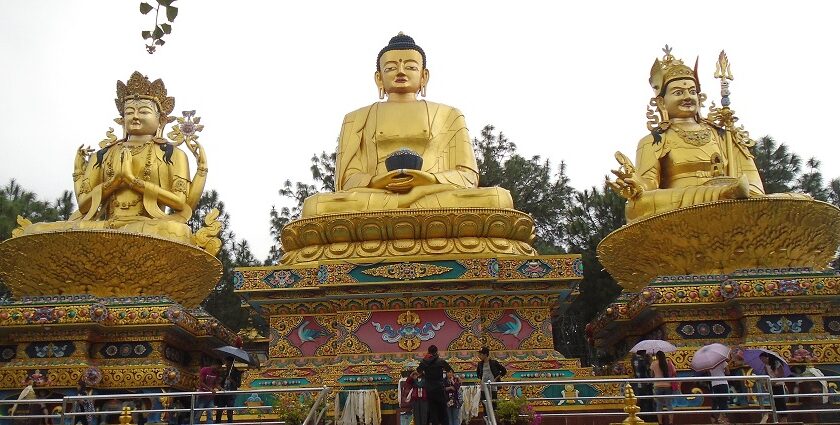 Photo of Swayambhunath Temple's iconic stupa with golden spire and prayer flags.