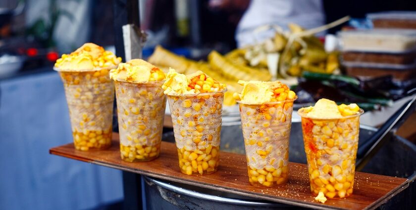 Freshly cooked sweet corn displayed for sale - one of the best street food in Vizag.