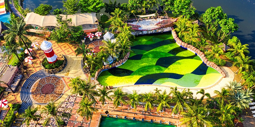 An image of Tafreeh Agro Water Park showcasing serene surroundings and diverse water rides.