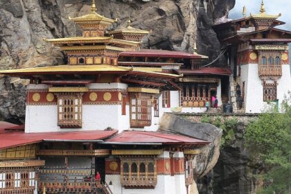 Taktsang Monastery perched on the cliffside, surrounded by the pristine Himalayan landscape in Bhutan.