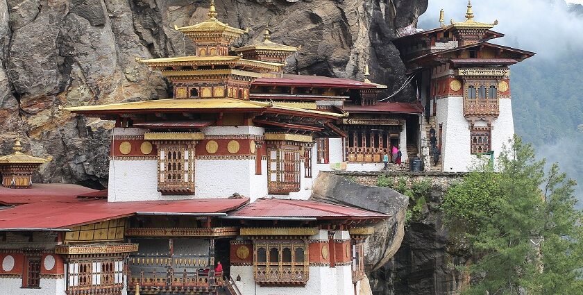 Taktsang Monastery perched on the cliffside, surrounded by the pristine Himalayan landscape in Bhutan.