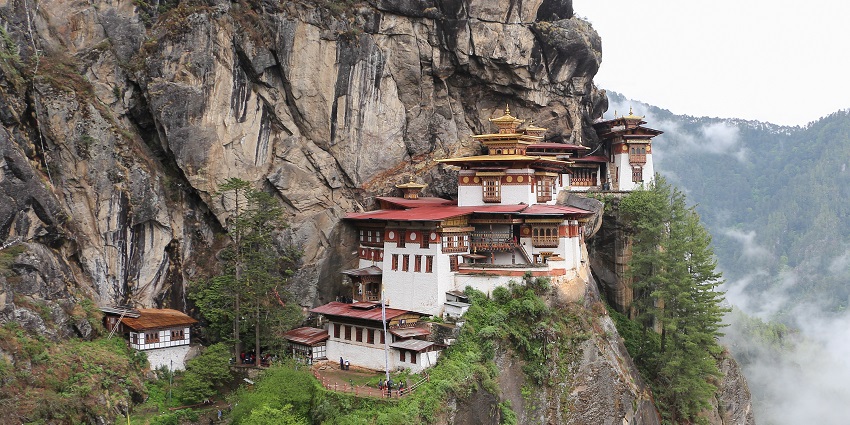 Taktsang Monastery, a holy temple in Bhutan, perched on a cliff.