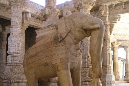 Statues and carvings at Tapovan Temple, featuring intricate architecture and details.