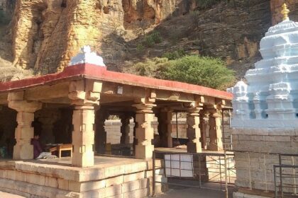 A breathtaking view of a white cave temple in Andhra Pradesh during the daytime.