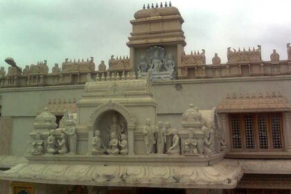 A breathtaking view of a temple in Andhra Pradesh with white architecture during the day.