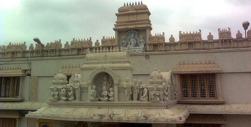 A breathtaking view of a temple in Andhra Pradesh with white architecture during the day.