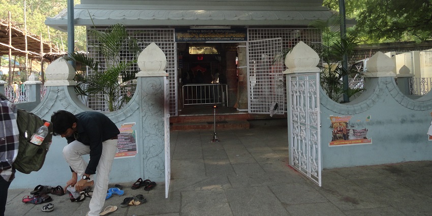 Devotees praying at Anjaneya Temple in Appalayagunta, surrounded by serene beauty.