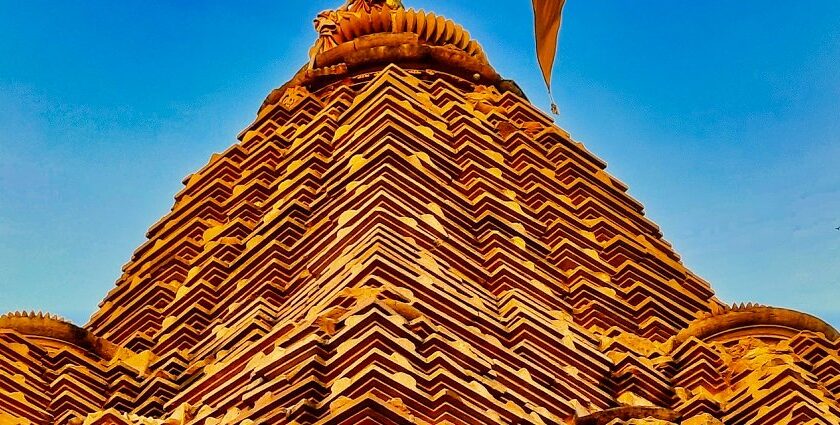 An upper view of the iconic spiritual hub with a flag in the region of Madhya Pradesh.