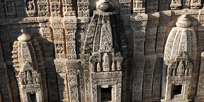 Ancient temple remnants within the historic Kangra Fort in Himachal Pradesh, India.