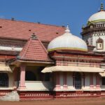 Image of a temple in Goa with lush green surroundings - explore the temples in south Goa