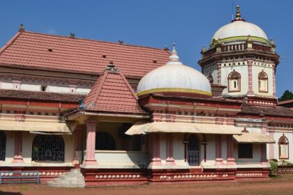 Image of a temple in Goa with lush green surroundings - explore the temples in south Goa