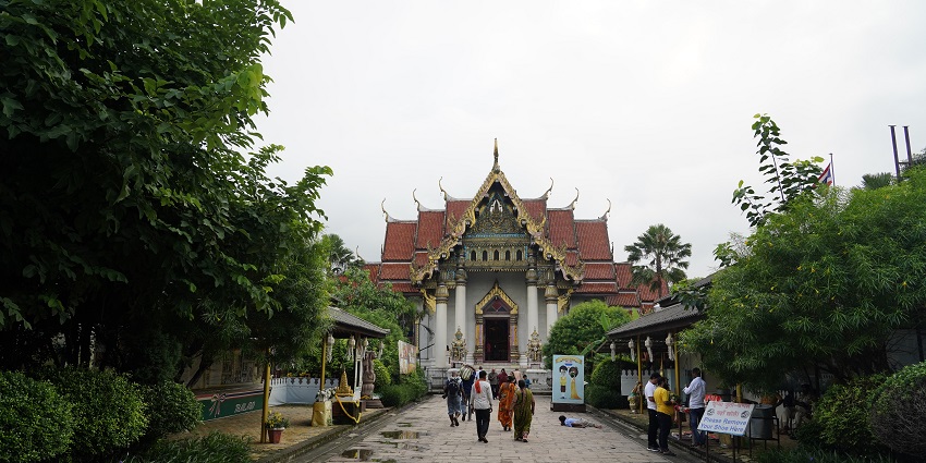Wat Thai Monastery in Bodhgaya is surrounded by gardens and traditional Thai architecture