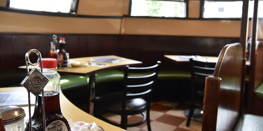 Modern interiors and aesthetic seating of a family restaurant, similar to The Embassy