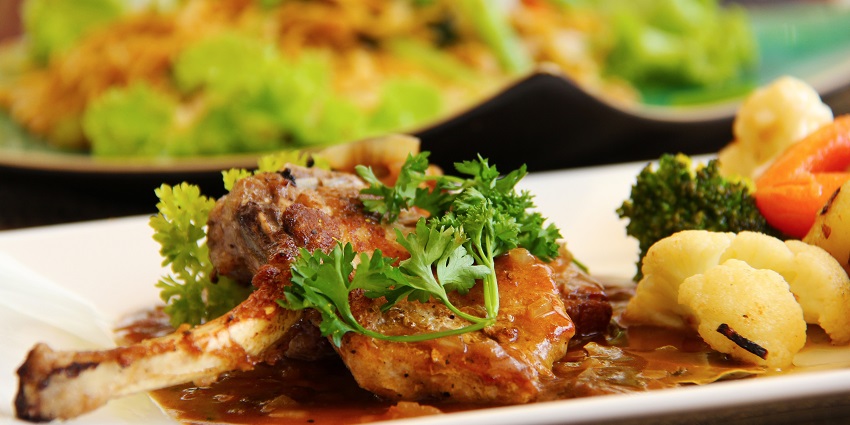 Enjoy delicious lamb chops that are spiced at the Embassy in Connaught Place
