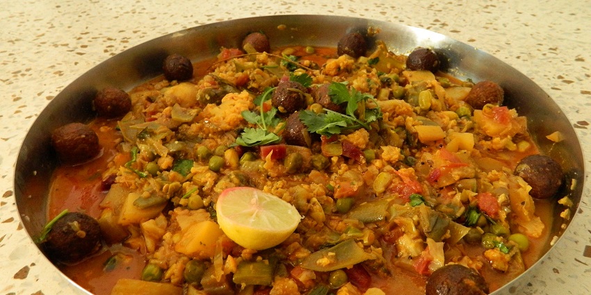 Undhiyu served in a plate, perfect for tourists seeking to taste local dishes
