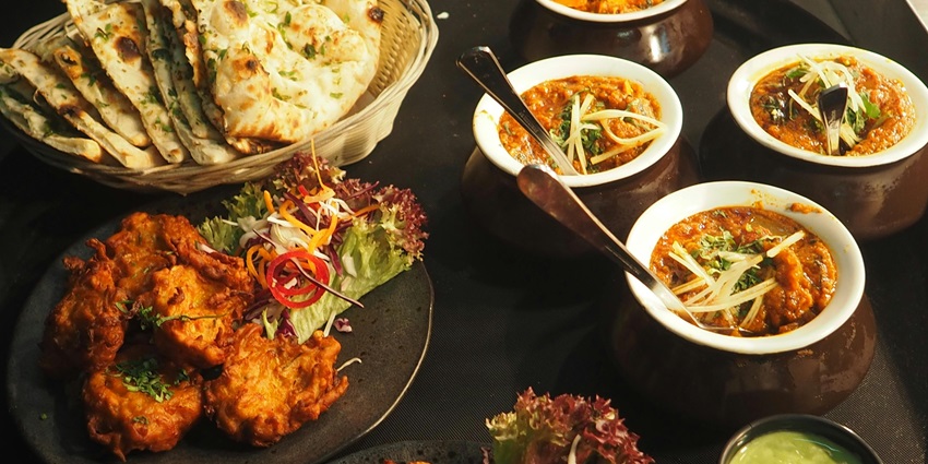 A close up of dining table at Punjab Grill to try traditional cuisine at this New Year.