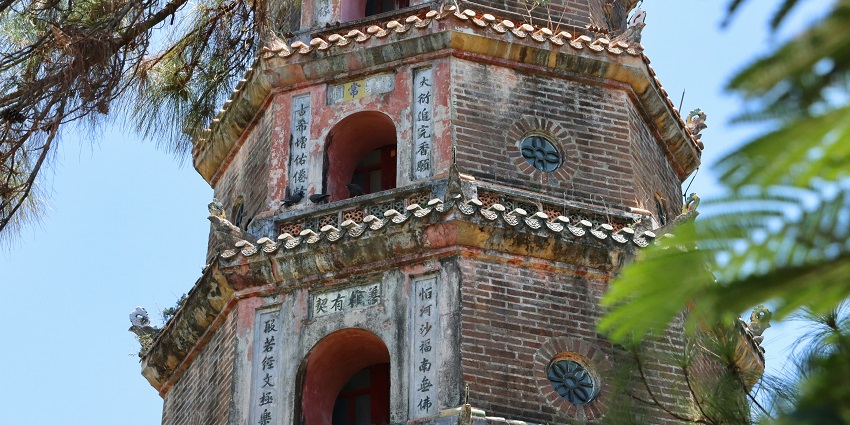 The iconic Thien Mu Temple, a significant Buddhist temple surrounded by lush greenery.