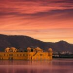 Jal Mahal in Jaipur, reflecting beautifully on the lake, offering a romantic and scenic spot for couples.