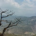 An image of Morni hills and valleys stretching into the horizon, a famous spot in Haryana.