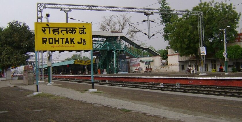 A view of Rohtak railway station, featuring its structure and surrounding area.