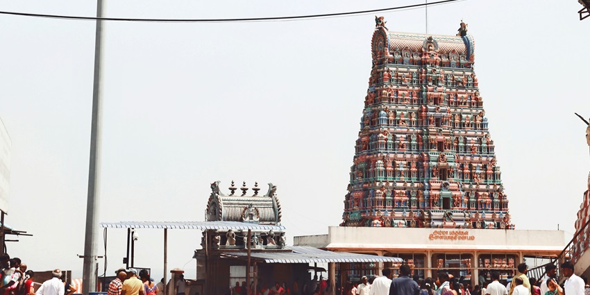 Offer prayers at the Thiruthani Murugan Temple located in a small town in Tamil Nadu.