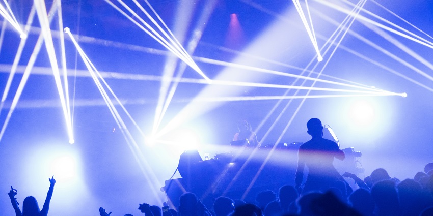 A glimpse of people dancing and grooving to the beats at the club of the region.
