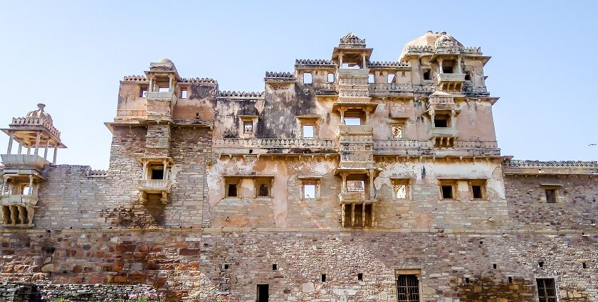 Panoramic view of Todgarh Fort amidst lush greenery, showcasing its natural grandeur