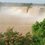 An image showing the beauty of Chitrakoot waterfalls descending down from hils–Best places to visit in Chitrakoot