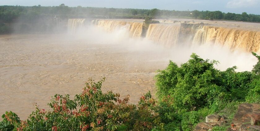 An image showing the beauty of Chitrakoot waterfalls descending down from hils–Best places to visit in Chitrakoot