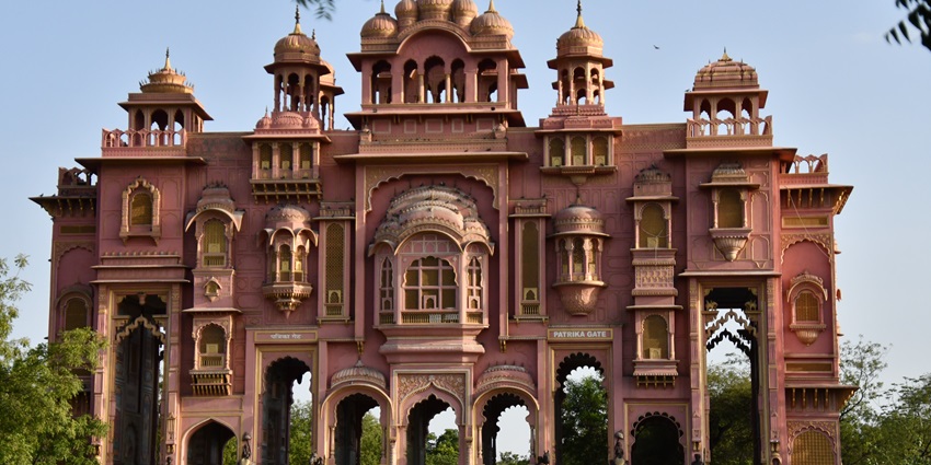 Colorful Patrika Gate in Jaipur showcasing detailed Rajasthani art and architecture.