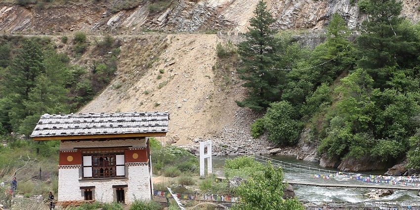 An image of the peaceful Torsa River in Bhutan which is a lovely spot for a riverside picnic.