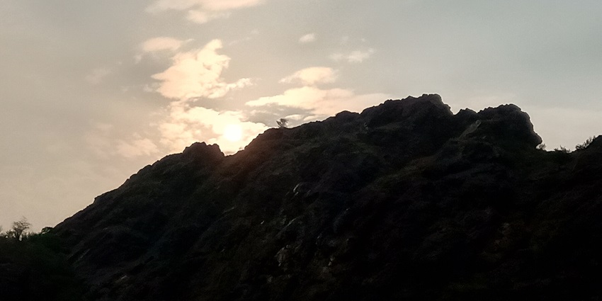 Panoramic view of the idyllic sunset over the Tosham Hill in the beautiful landscape of Haryana