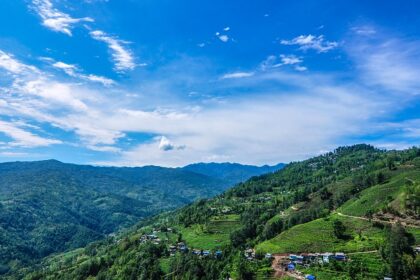 Scenic trails amidst Himalayan peaks in the background, perfect for trekking in Nepal.