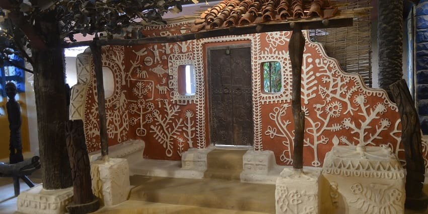 A vibrant Tribal Museum showcasing rich cultural artefacts and traditional art.
