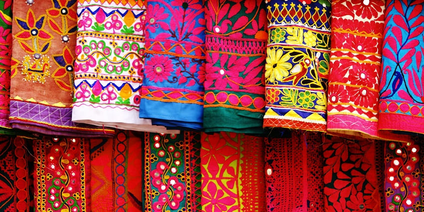 Tripolia Bazaar features vibrant textiles and exquisite bridal Rajasthani garments.