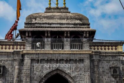 Places to visit near Tuljapur featuring entrance of the temple made up of black granite.