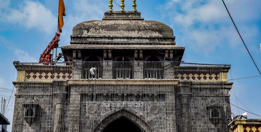 Places to visit near Tuljapur featuring entrance of the temple made up of black granite.