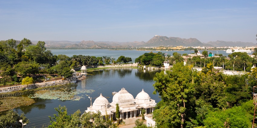 Picturesque view of the Udaisagar Lake, one of the places to visit in Udaipur for couples at night.