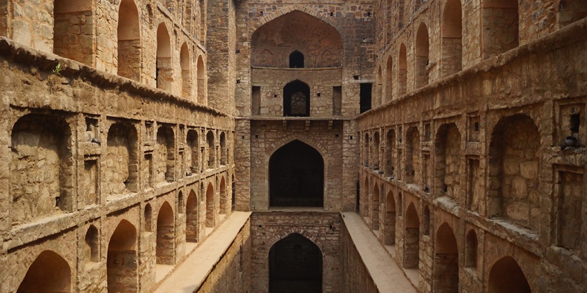 Ancient stone stepwell Agrasen Ki Baoli with arched walls and deep steps–places to visit near rajiv chowk