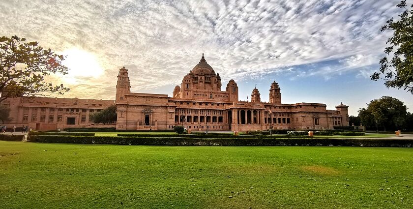 Interior view of a museum room inside Umaid Bhawan Palace, featuring large wooden display